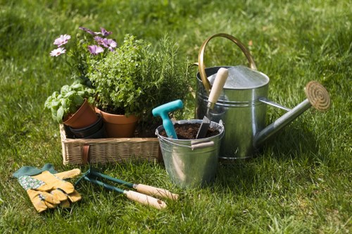 Gardener Millbank team preparing tools in a front garden